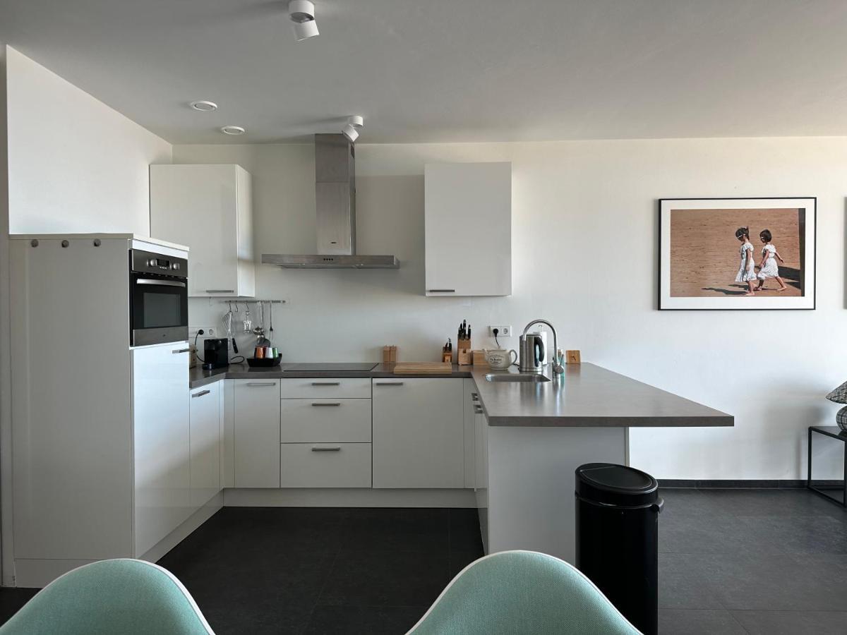 Appartement Met Frontaal Zeezicht In بلومِندال المظهر الخارجي الصورة